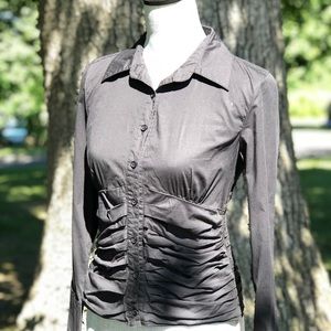 Women’s black button-down top.
